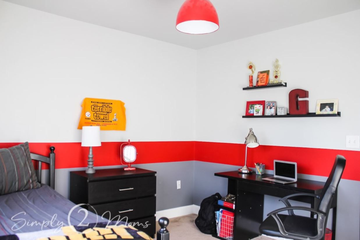 Boy's bedroom with red stripe around wall.