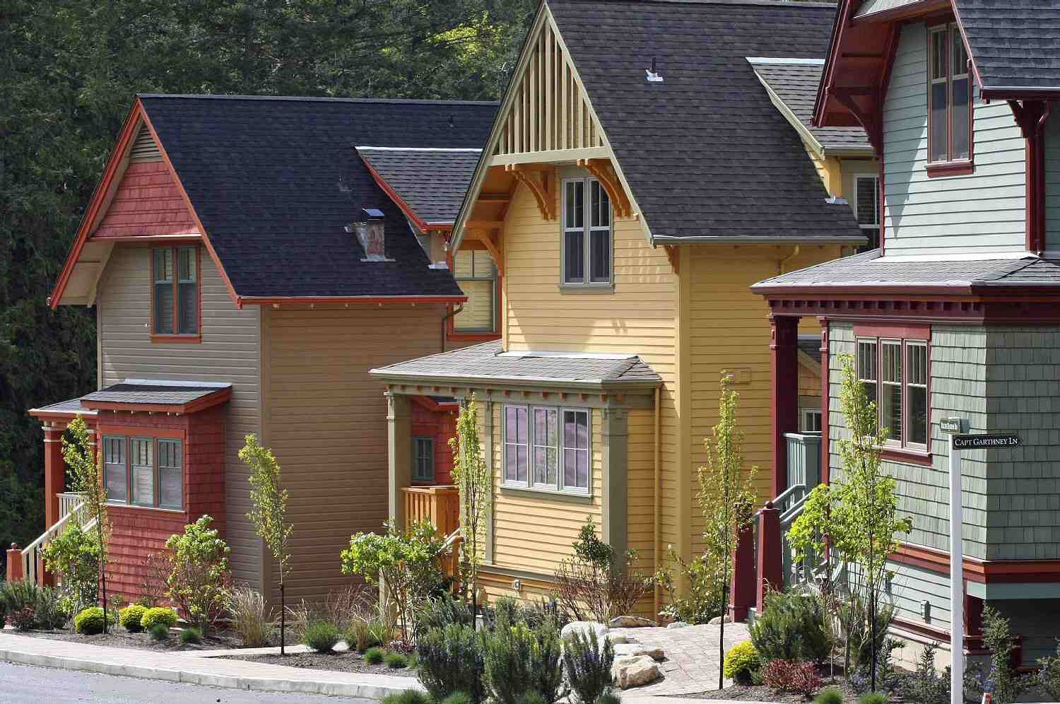 Three Colorful Cottages in a Seaside Village