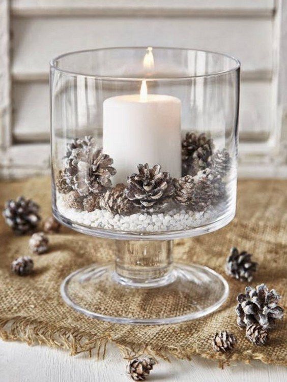 candle and pinecone centerpiece with candle