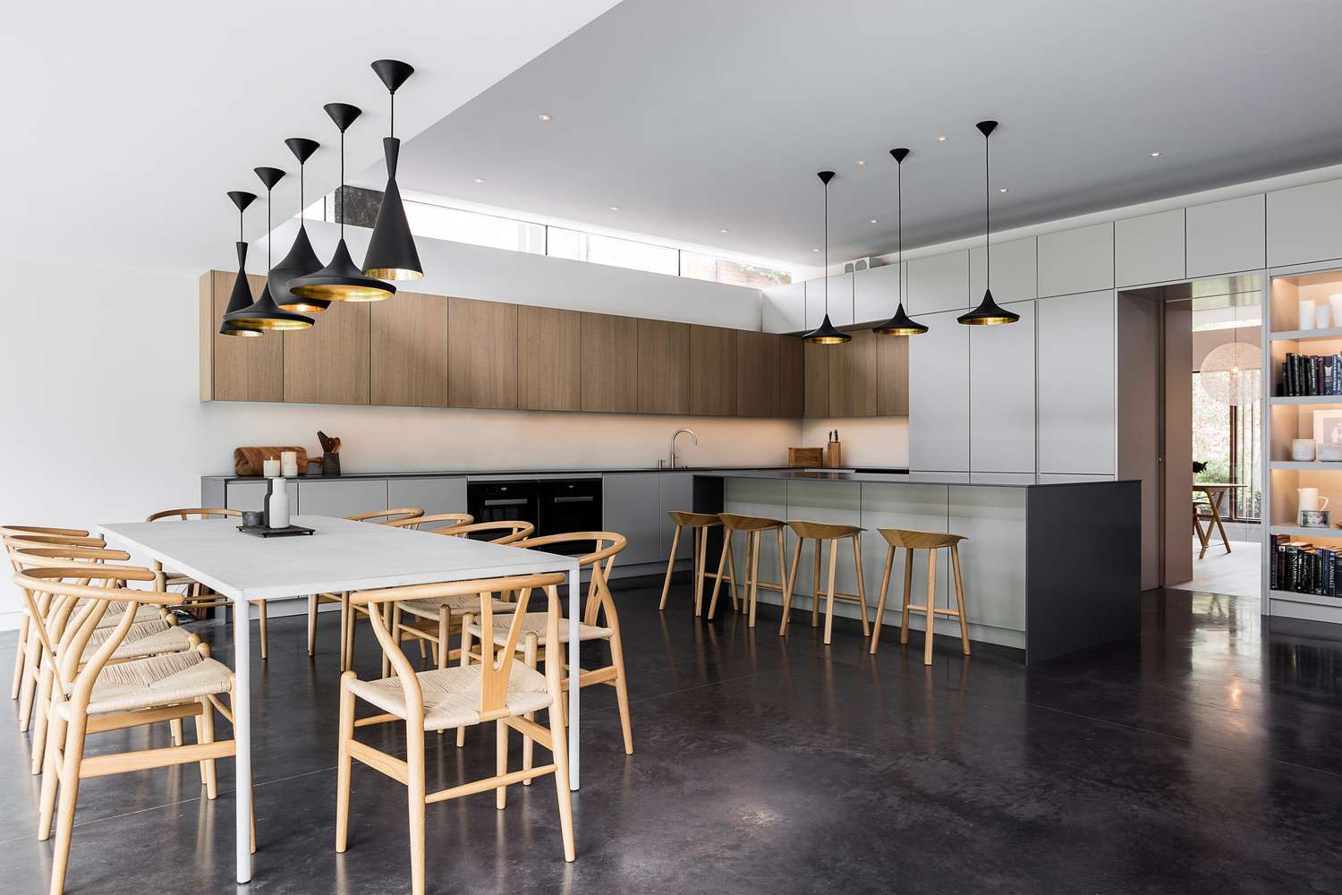 neutral open kitchen with wood cabinets