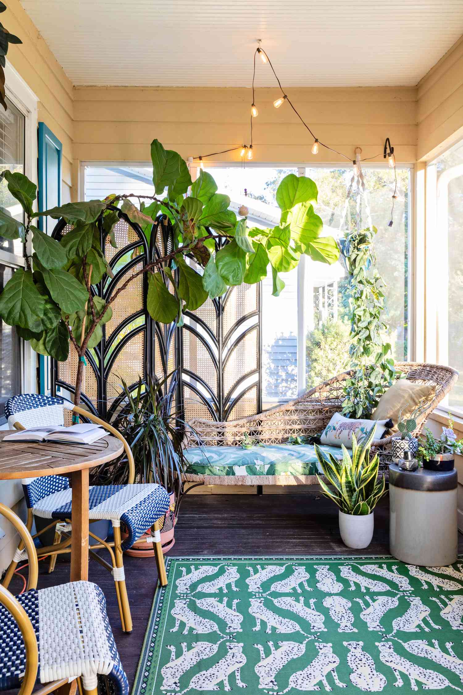 Florida house by Lisa Gilmore porch with plants