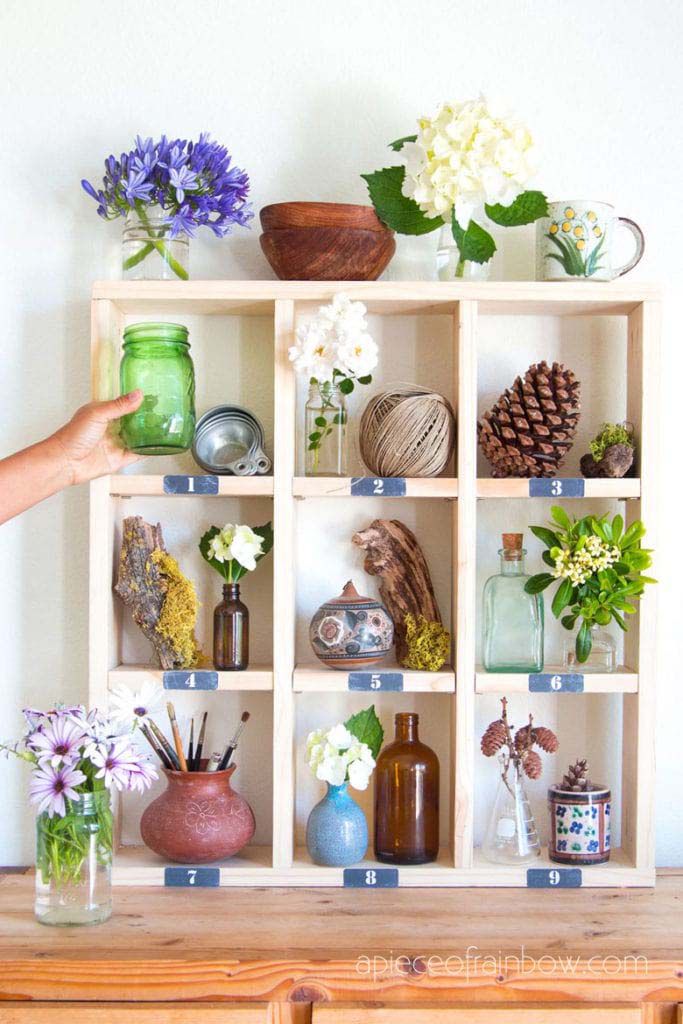 A cubby shelf full of decorations