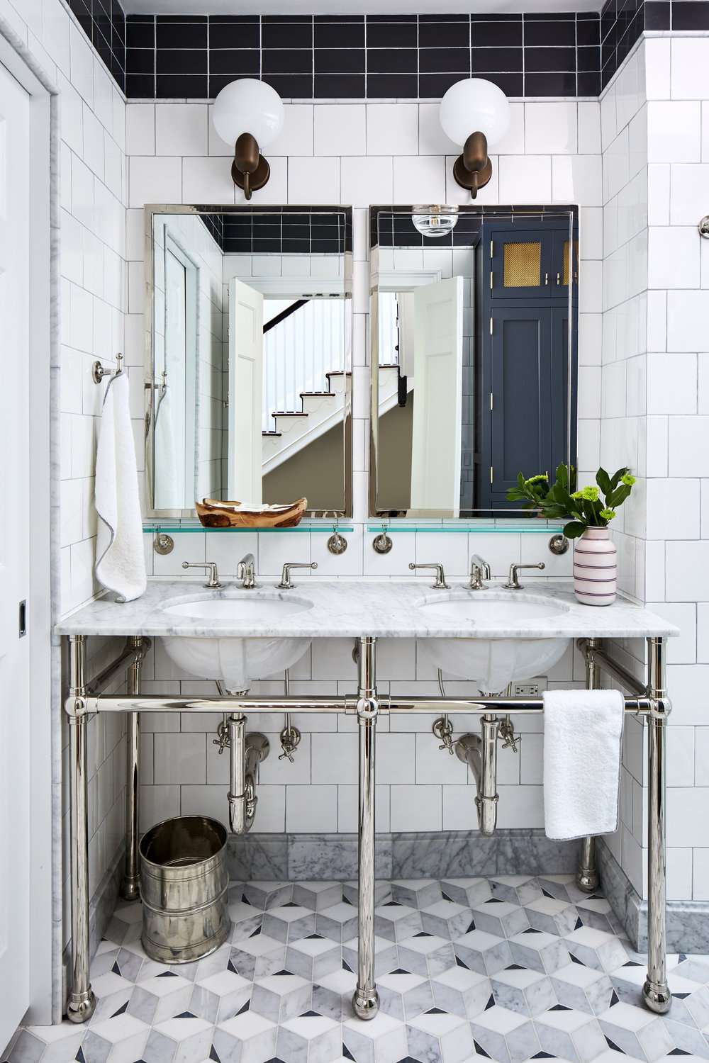 Globe sconces over bathroom vanity