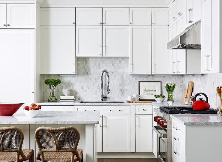 mini tiny grey marble tile backsplash in a white kitchen