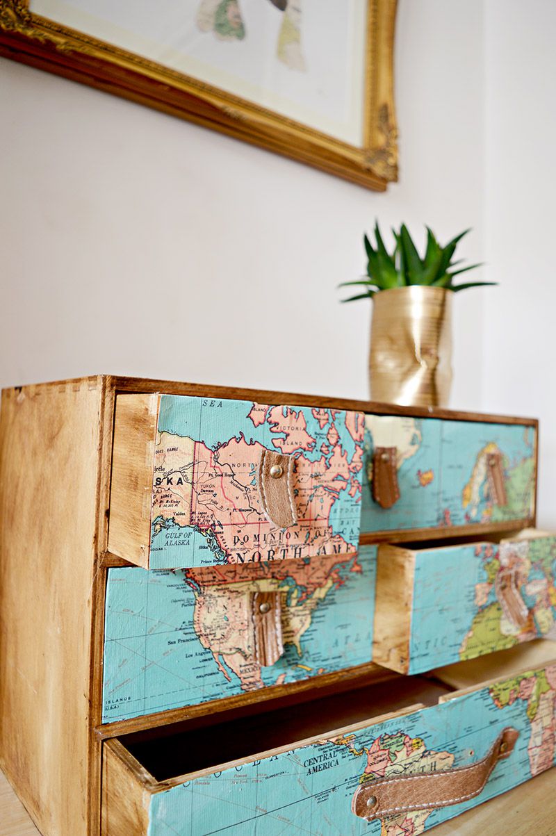 drawer dresser covered with map squares and leather pulls