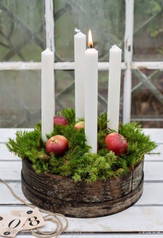 centro de mesa de manzana con velas
