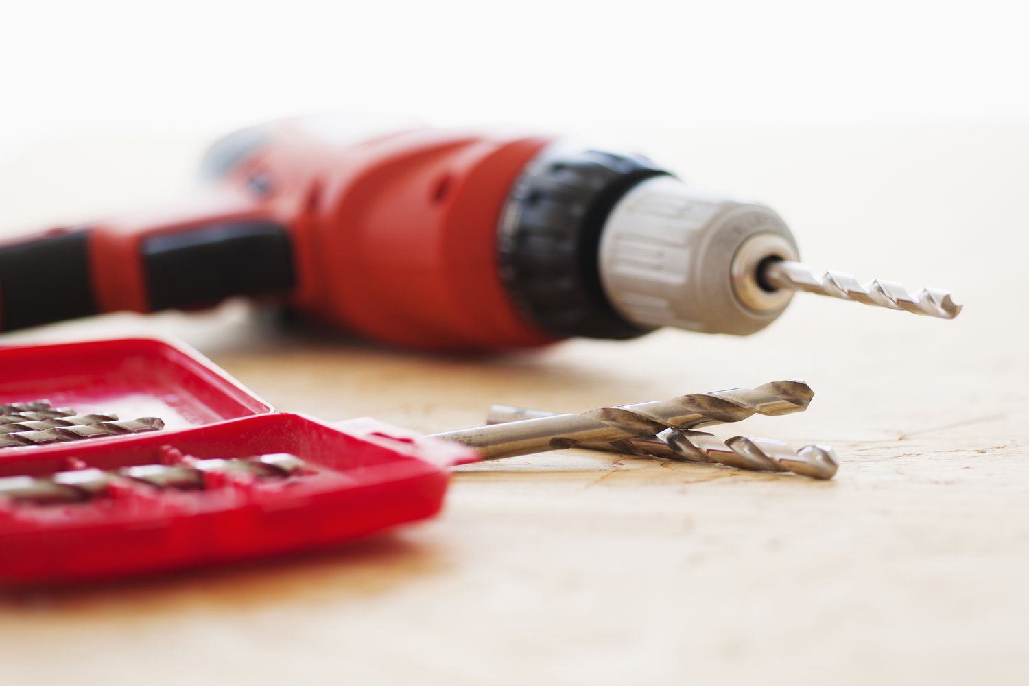 Close up of a drill and accessories