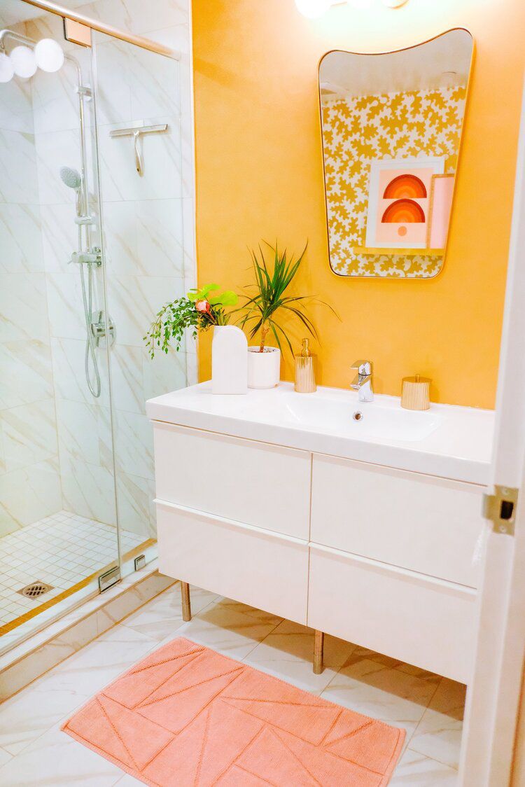 curry yellow bathroom accent wall