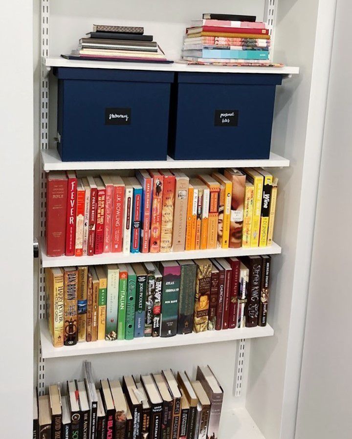 Lidded storage cubes on a bookshelf