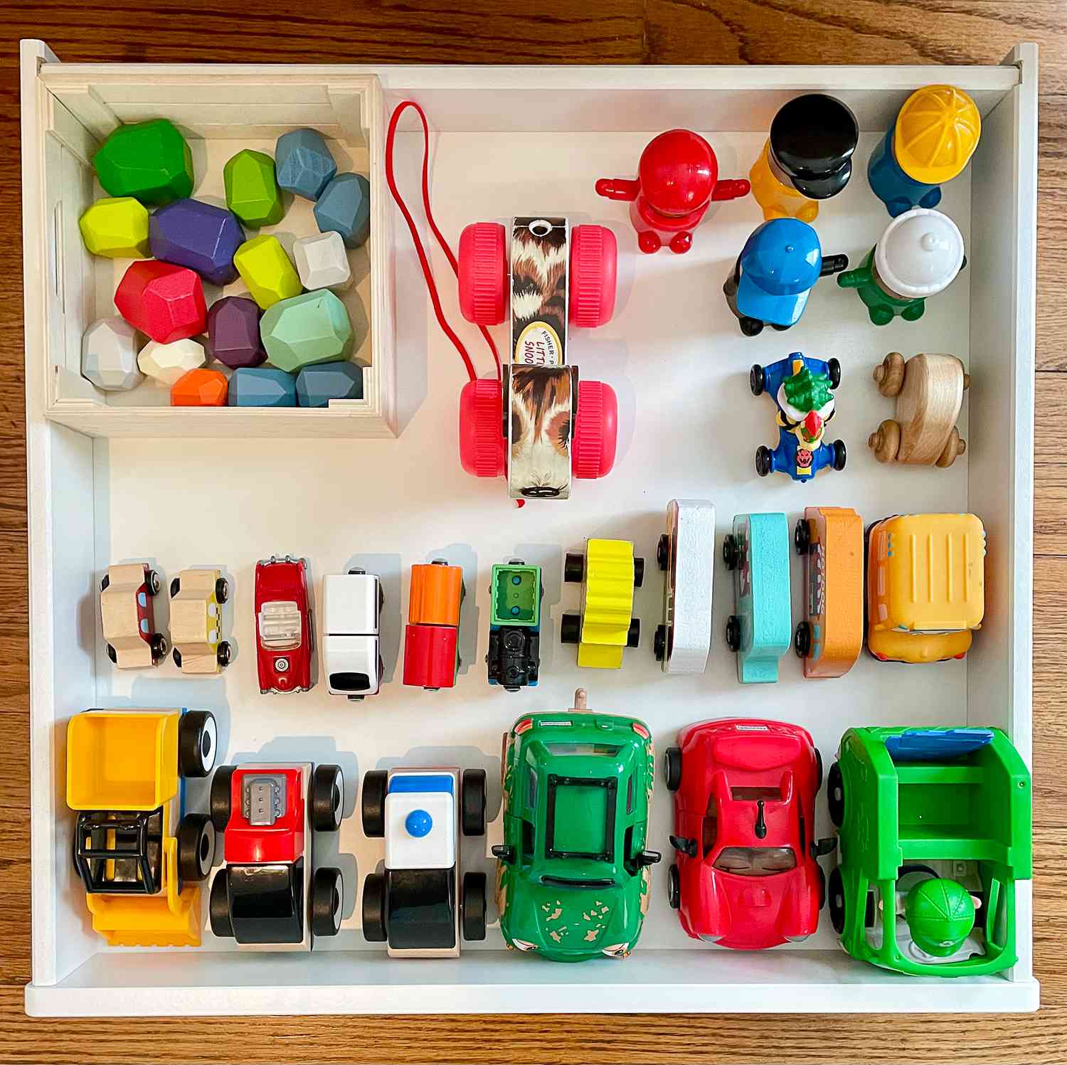 Unterbettschublade mit Spielzeug