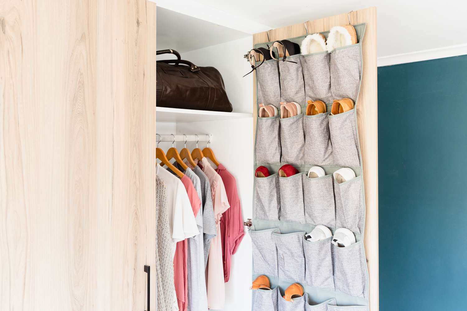 An over-the-door shoe organizer being used in a closet