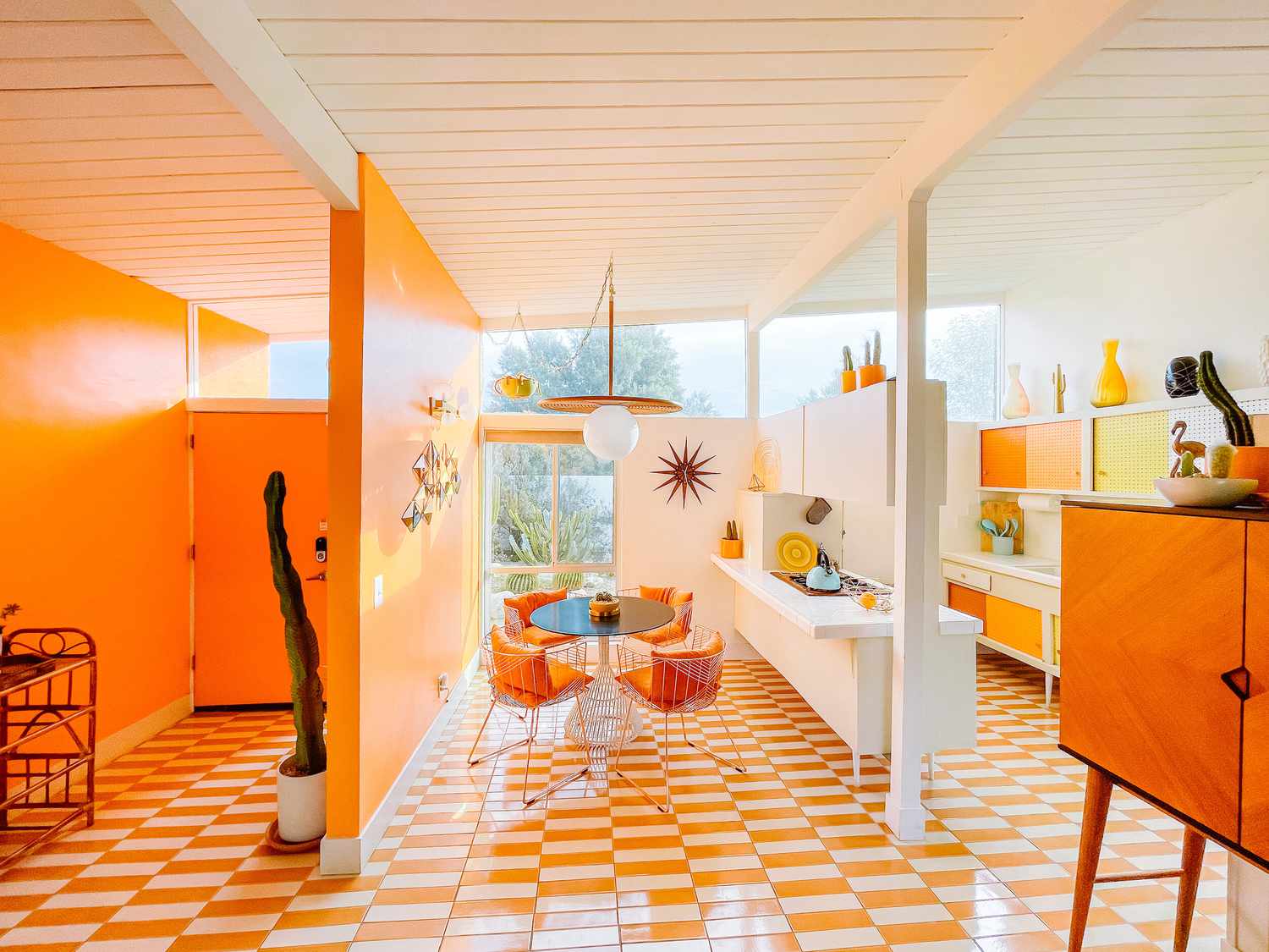 orange midcentury modern dining room 