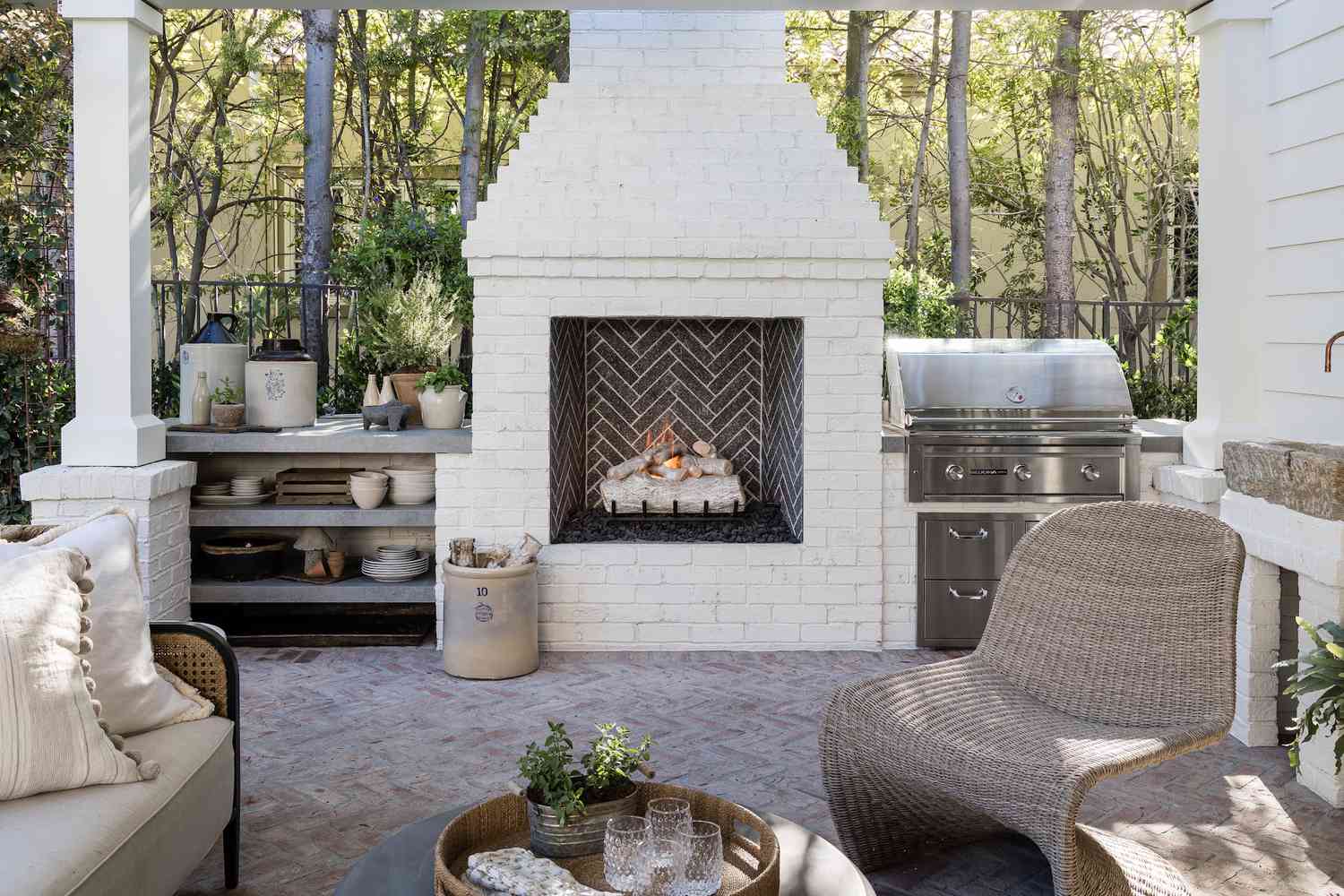 painted outdoor brick fireplace
