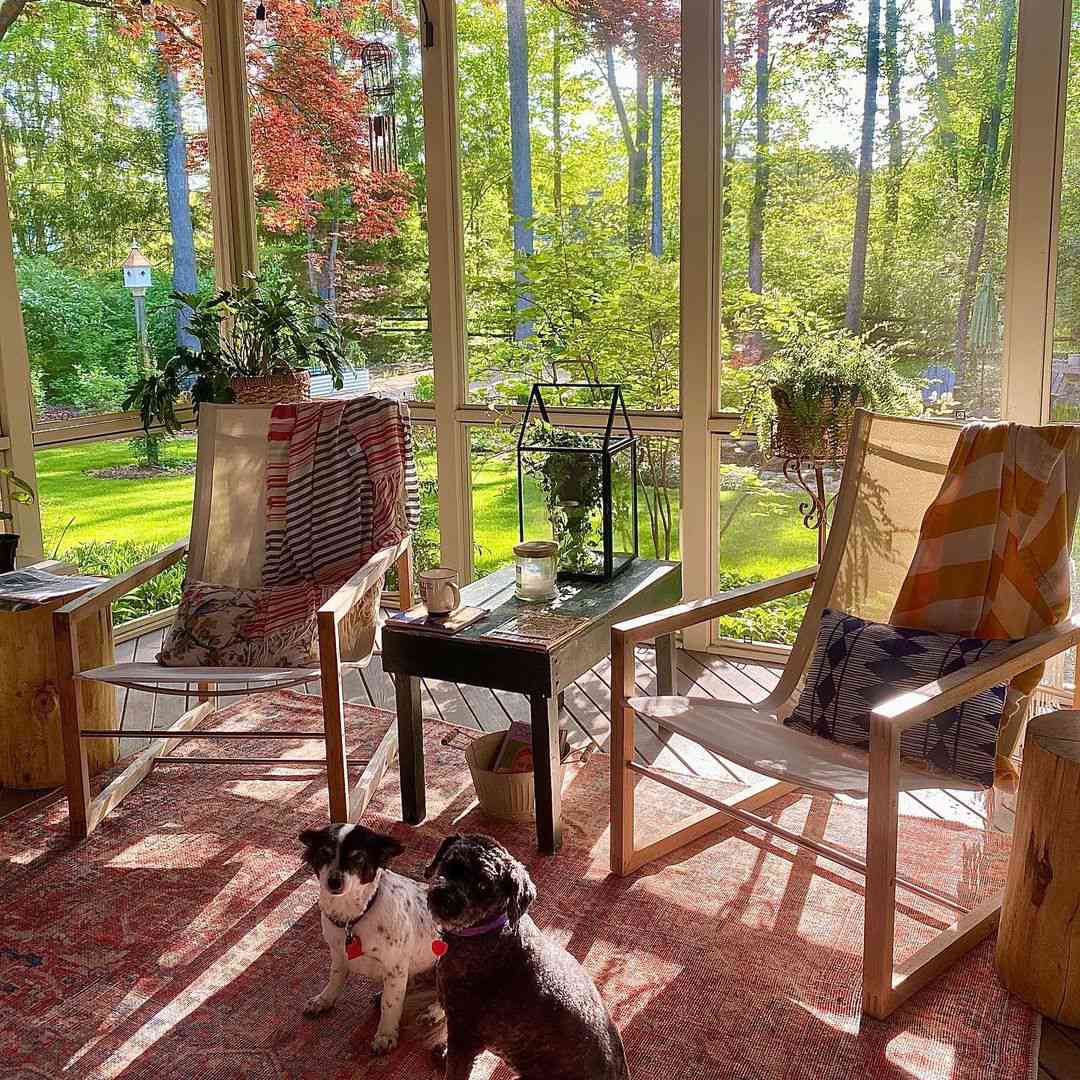 screen porch with side tables