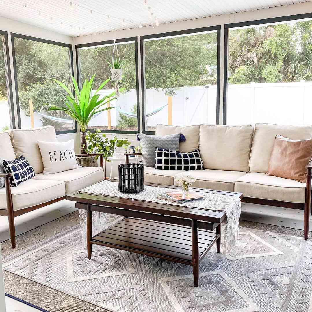 layered rugs on porch