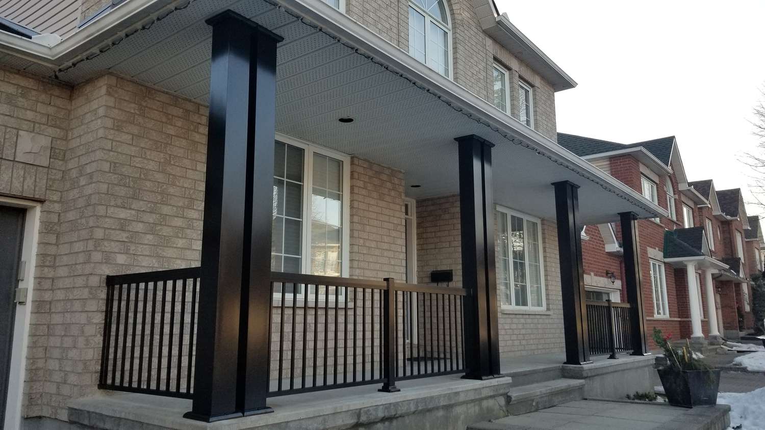 black porch columns