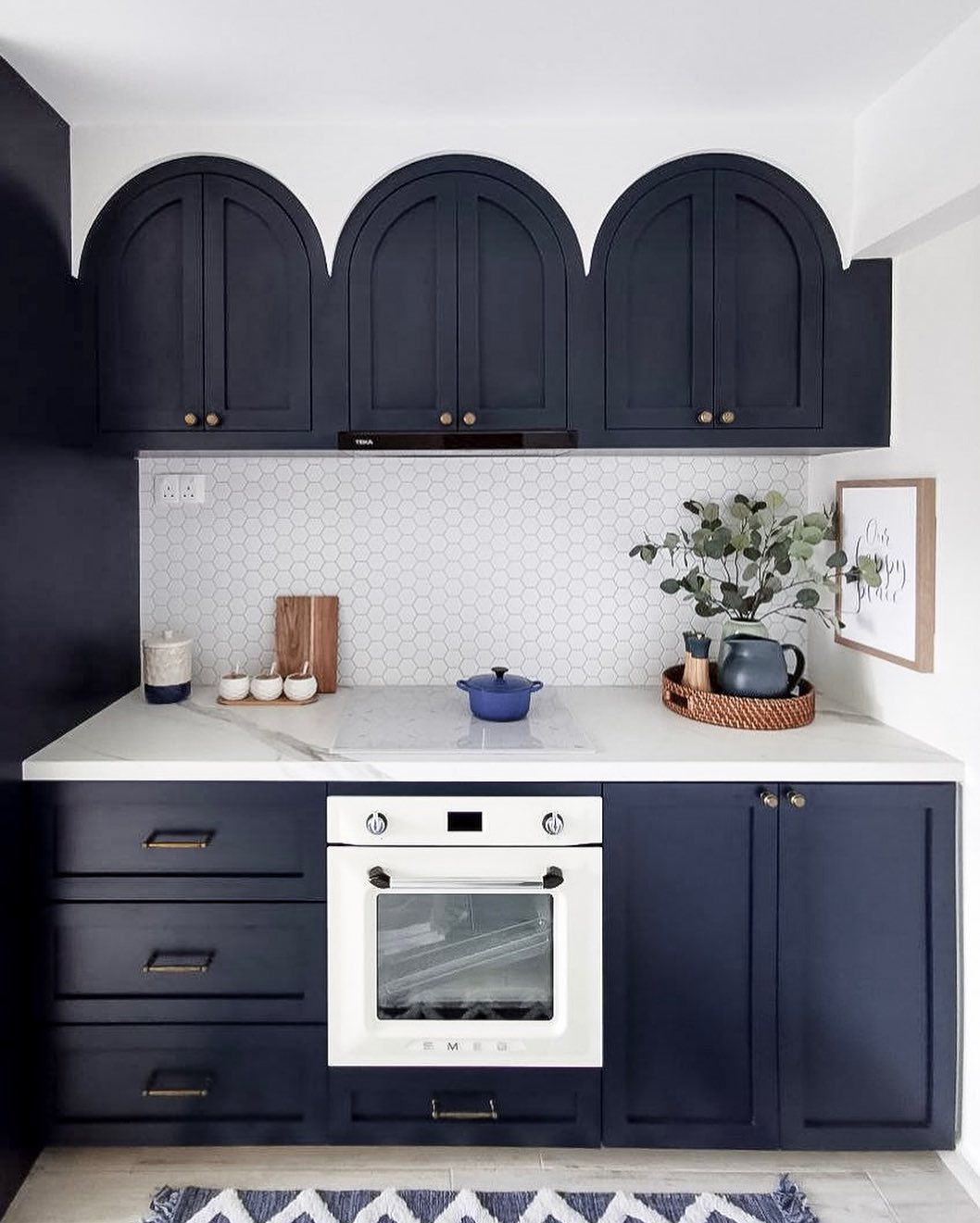 dark arched kitchen cabinets