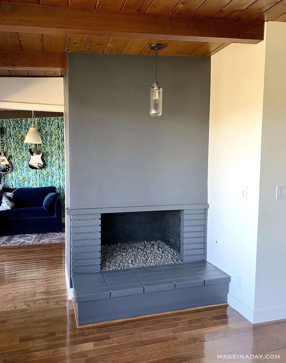 painted midcentury modern fireplace after photo