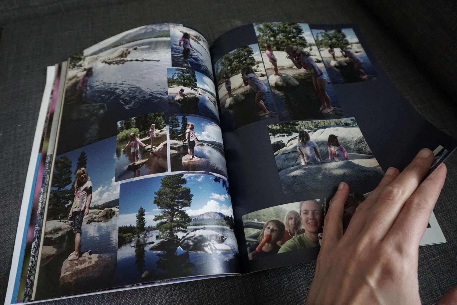 Person holding a photo book page
