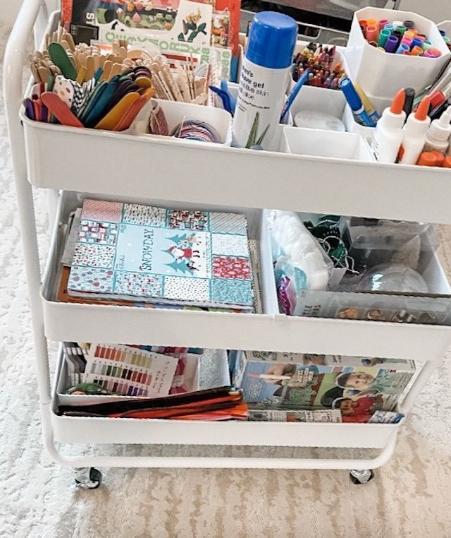 Rolling cart with stationery supplies inside