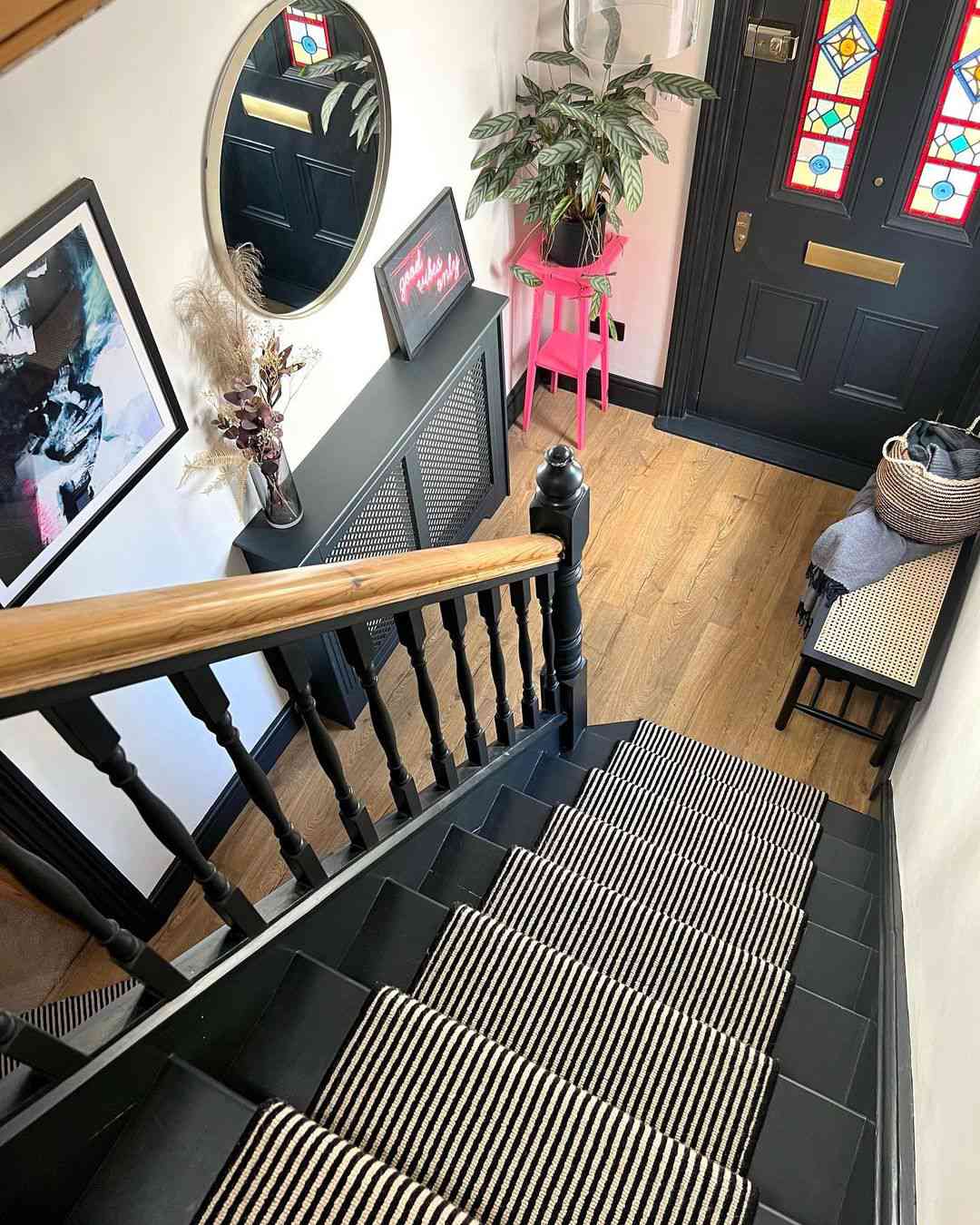 black front door with stained glass