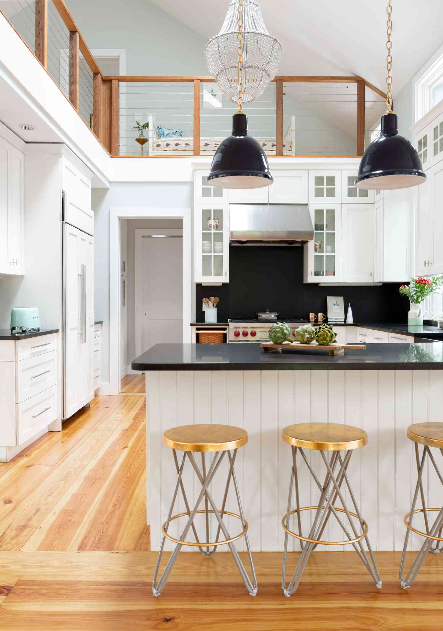 black backsplash with white cabinets