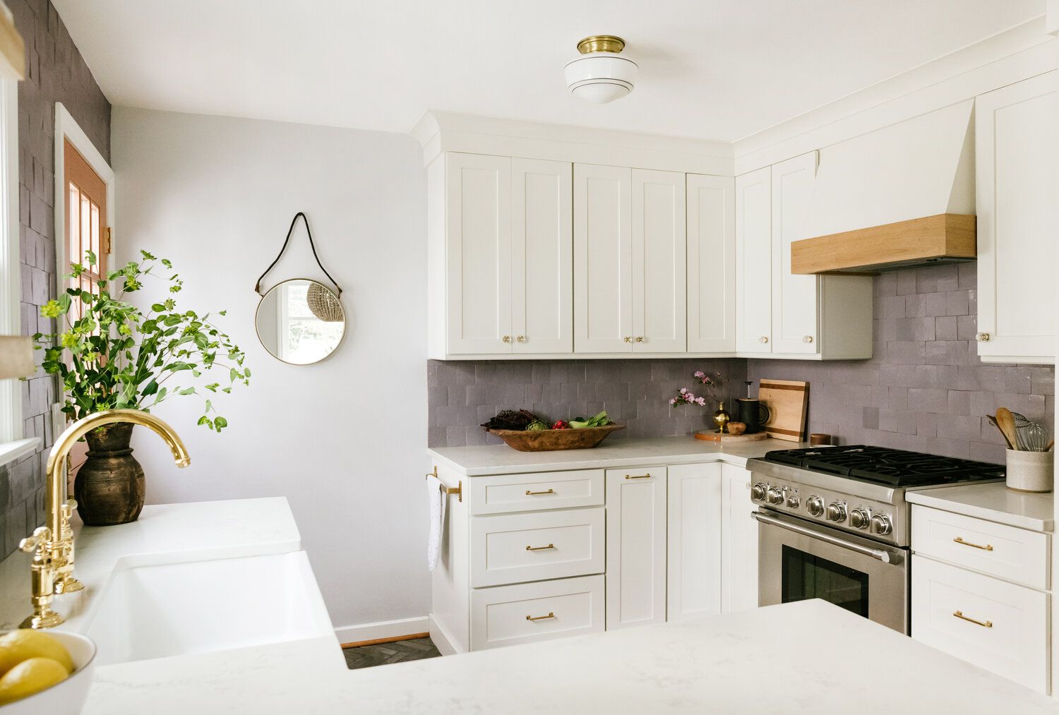 gray tile backsplash white cabinets