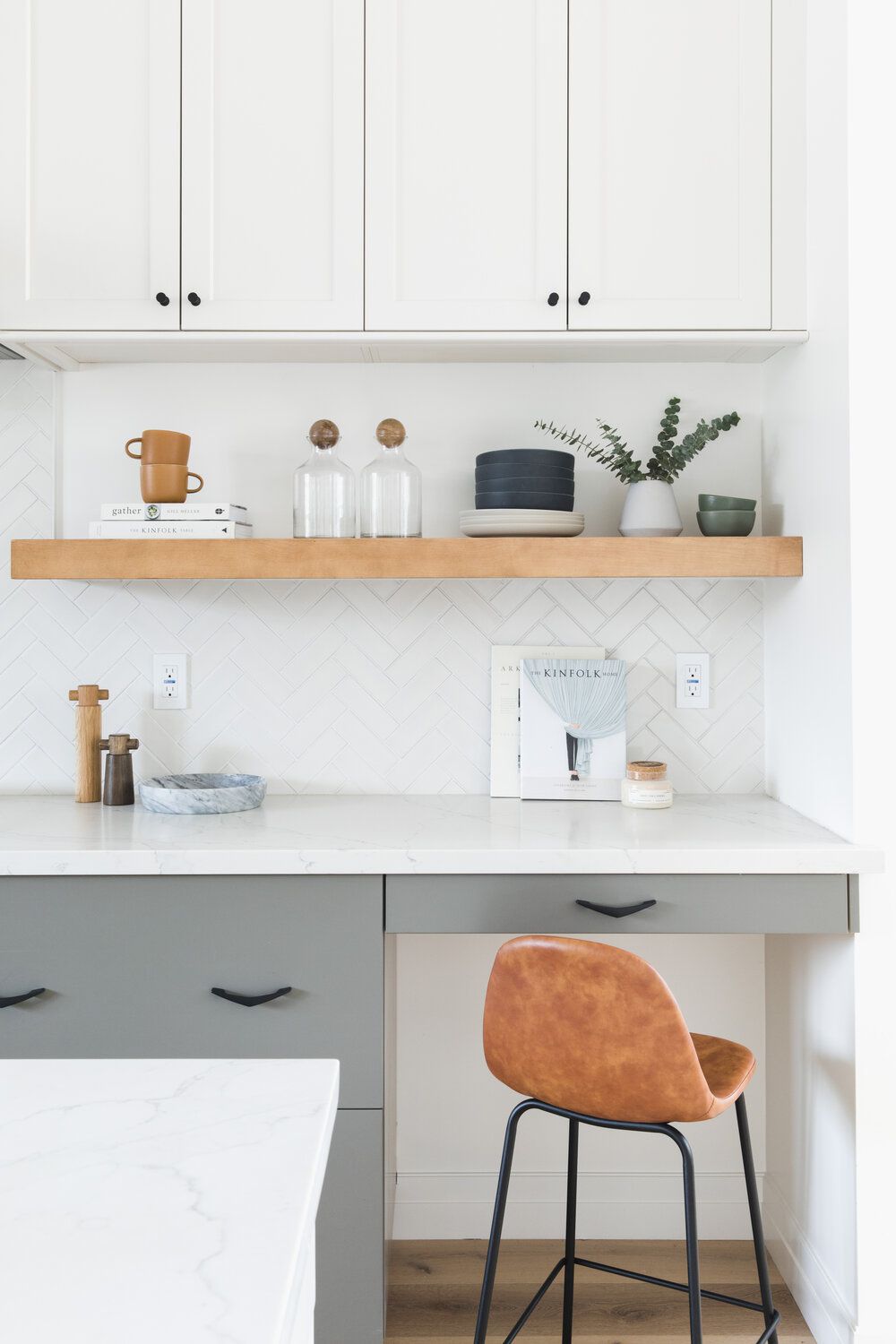 white herringbone subway tile backsplash