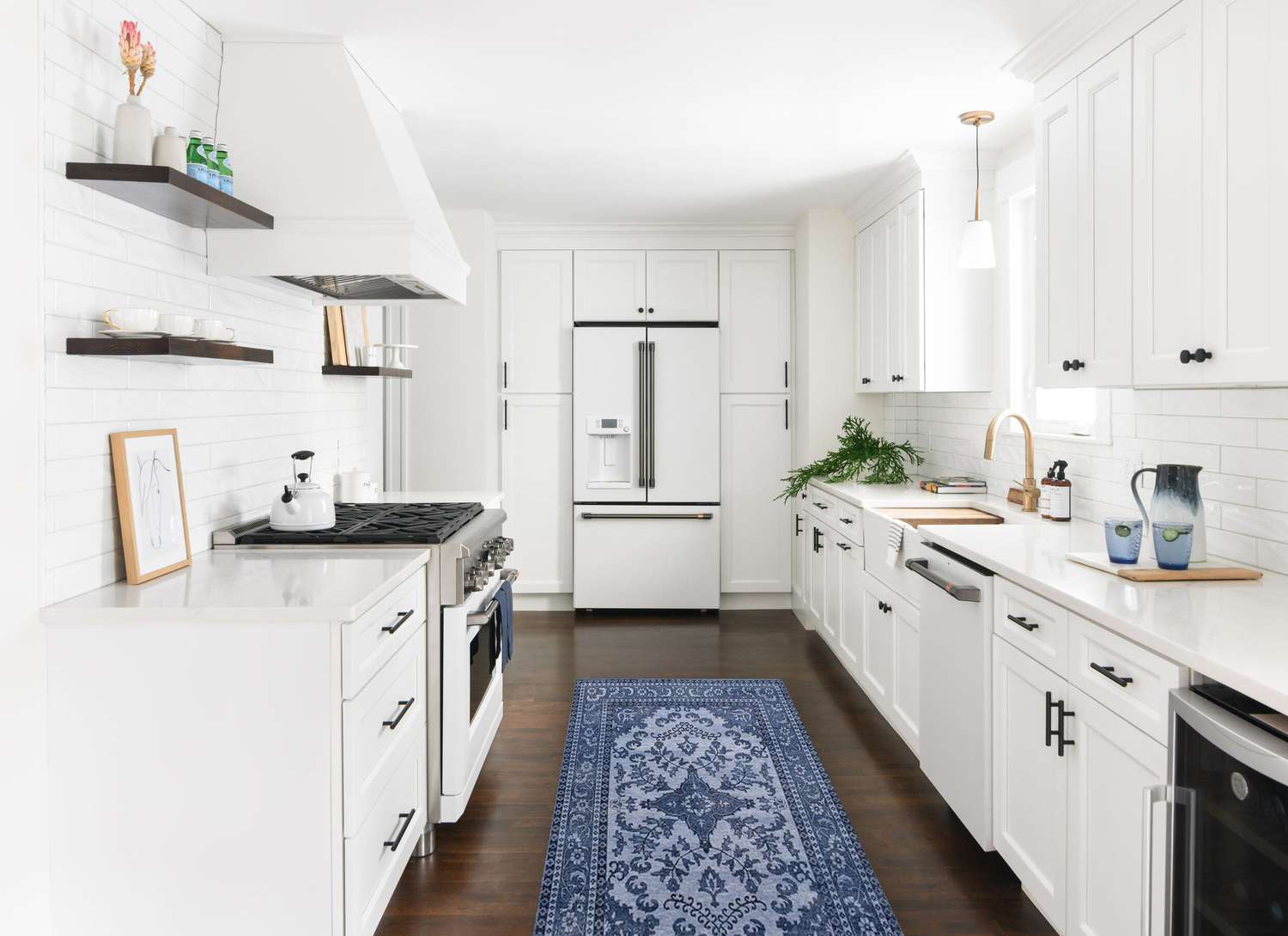 white subway tile with white cabinets