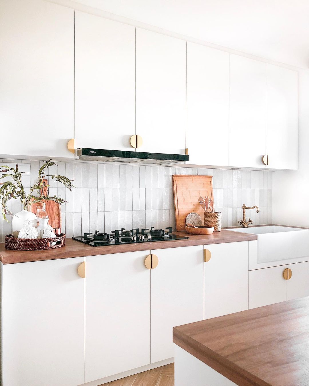 vertical stack tile backsplash white countertops