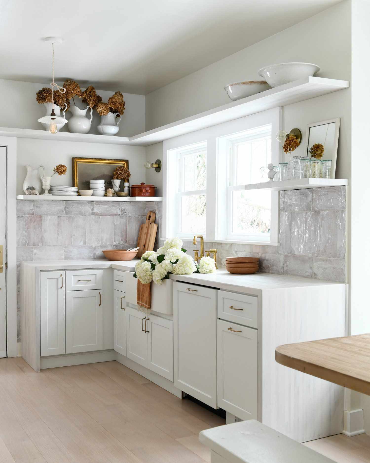 glazed tile backsplash with white cabinets