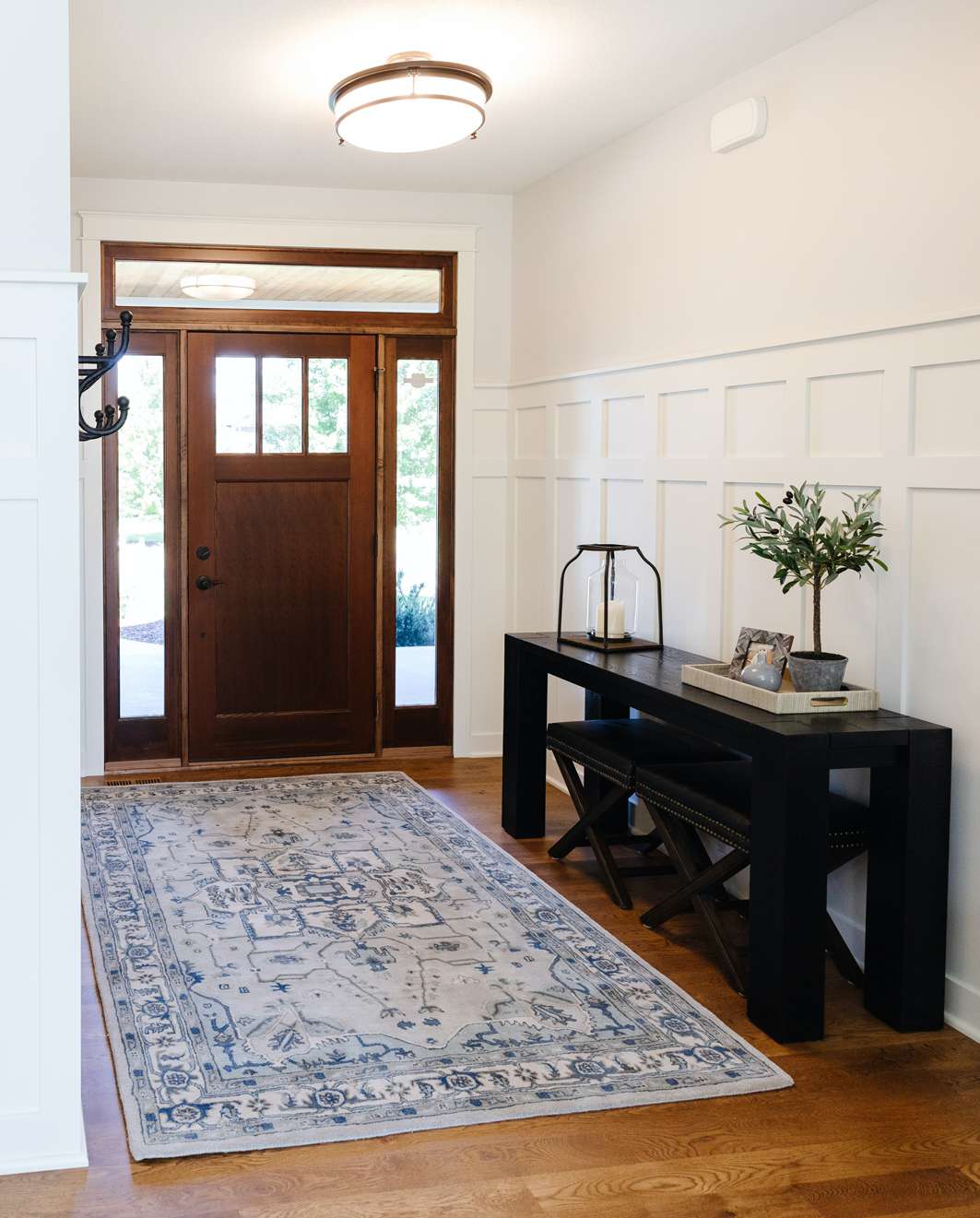 Entryway with simple flushed mount fixture.