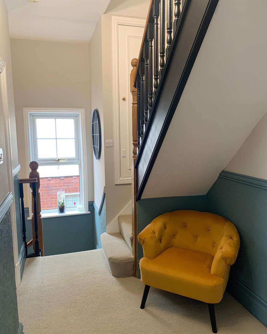 yellow accent chair in landing