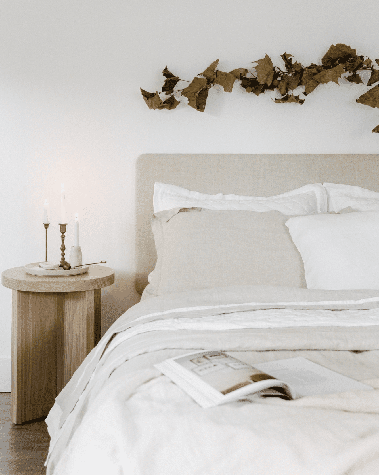 dried branches above bed 