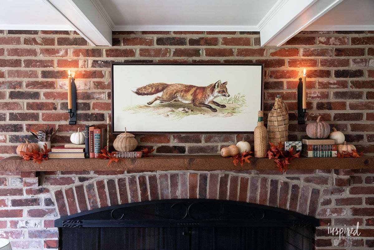 A piece of fall artwork on a mantle