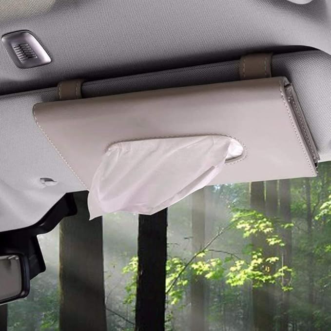 beige car tissue holder on sun visor