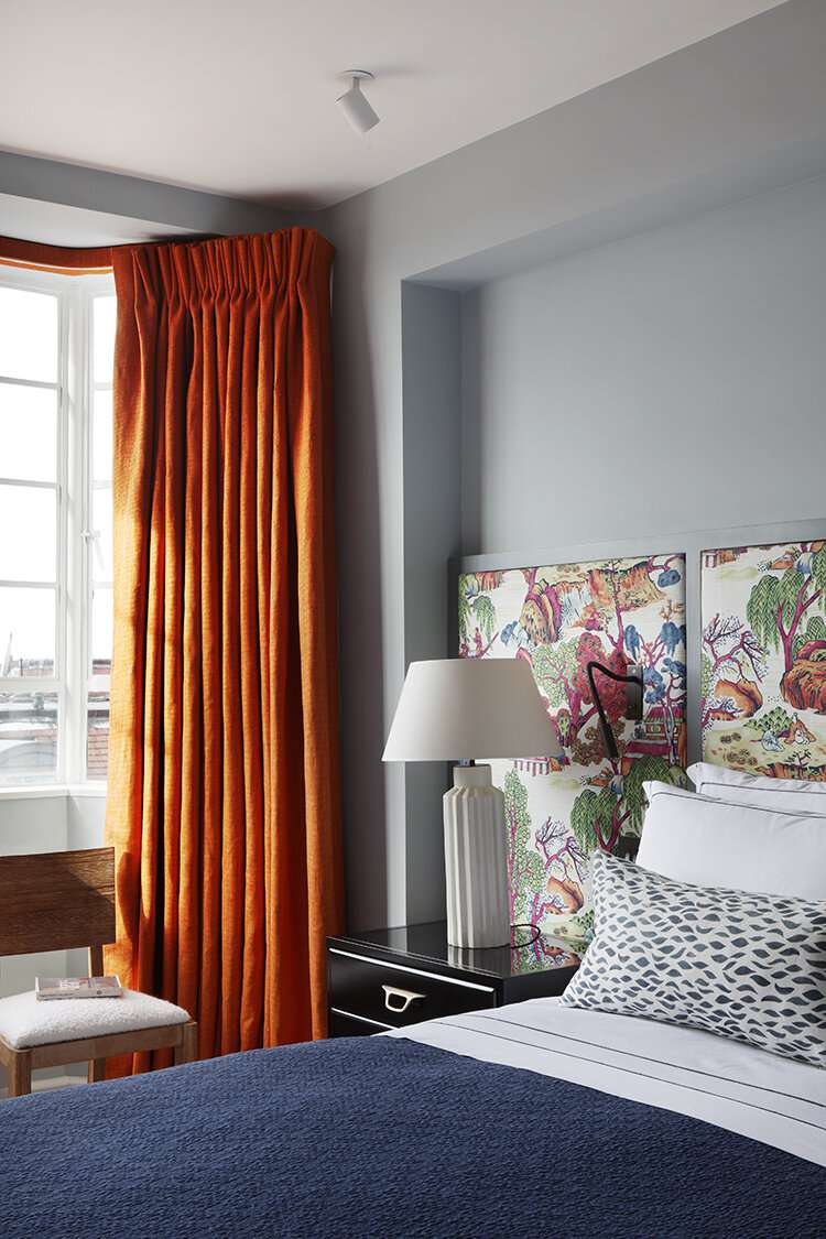 apartment bedroom ideas bold colored curtains