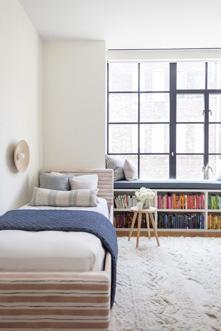 apartment bedroom ideas bookshelf bench under window