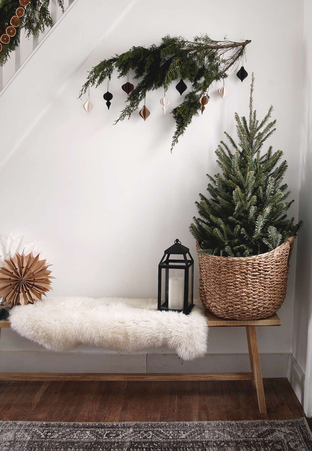 scandi christmas decorating mini tree in a basket