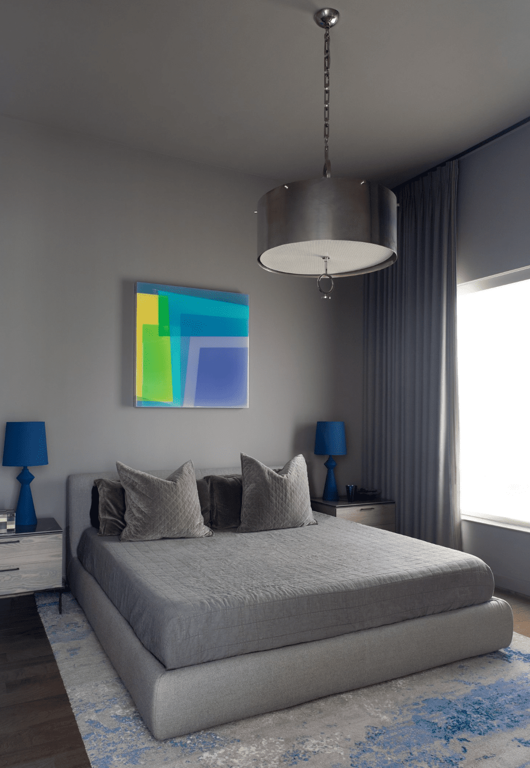 gray room with bright art
