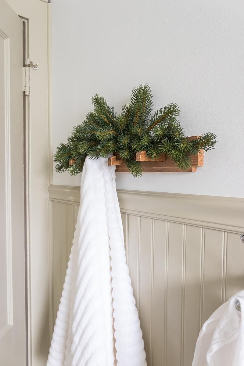 bathroom towel rack decorated for christmas