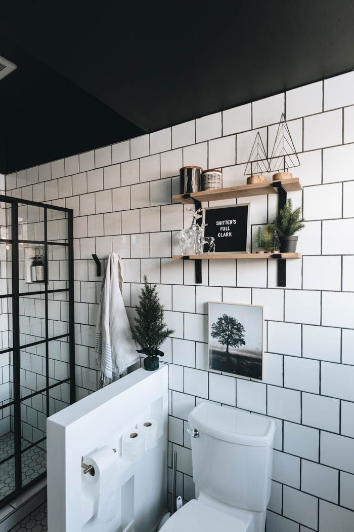 modern industrial-style bathroom decorated for christmas