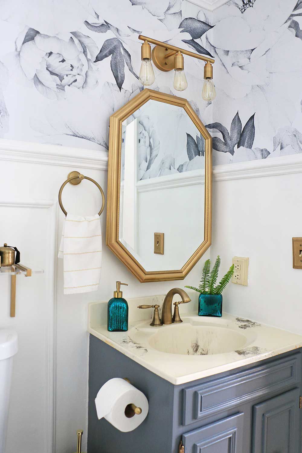 christmas bathroom with green glass soap dispenser