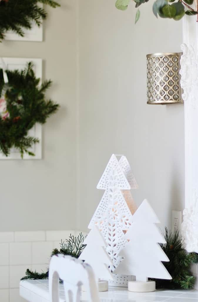 bathroom vanity decorated with christmas tree ornaments