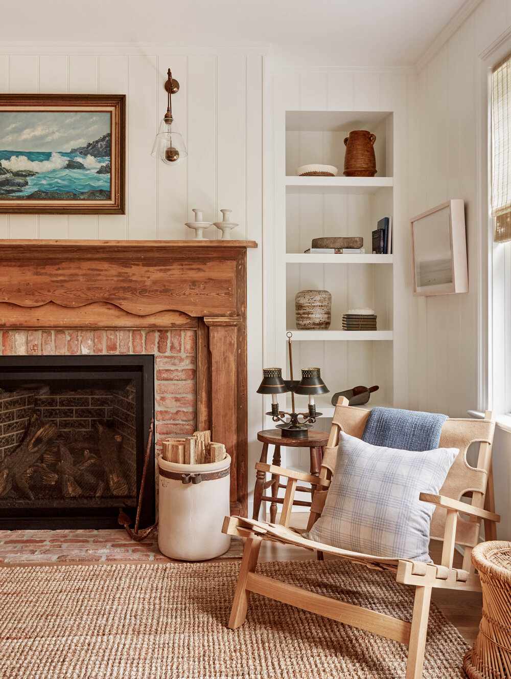 shiplap fireplace wall with antique wooden mantel