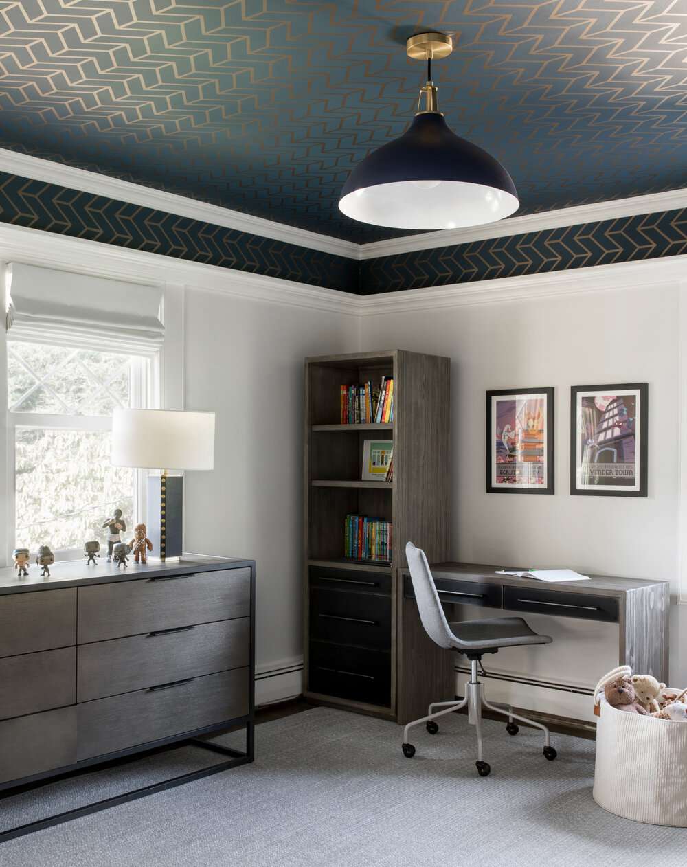 Large office with wallpapered ceiling accent.