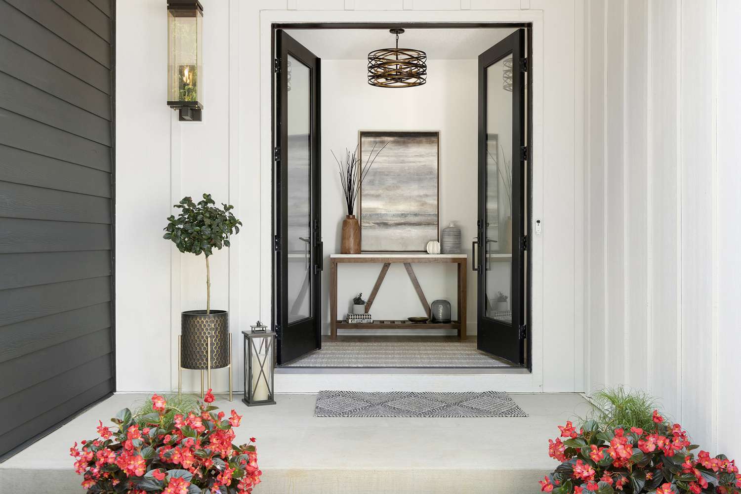 concrete front steps with flowers