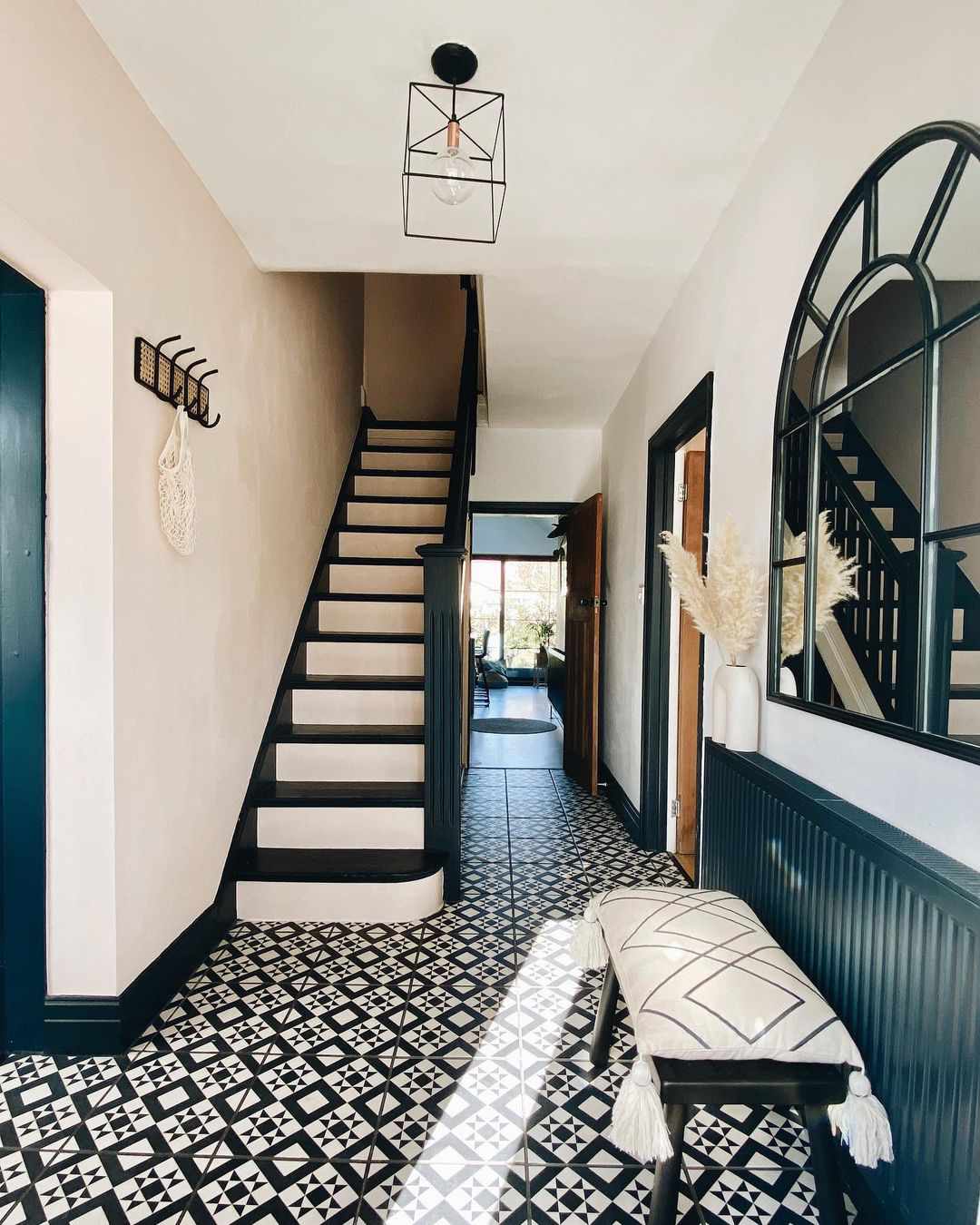 black and white stairs and matching floors