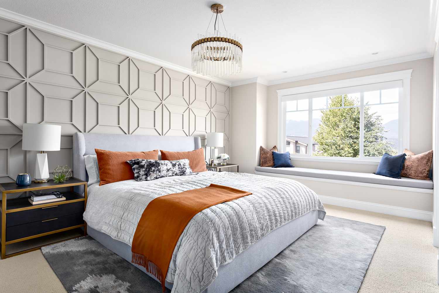 geometric accent wall behind bed