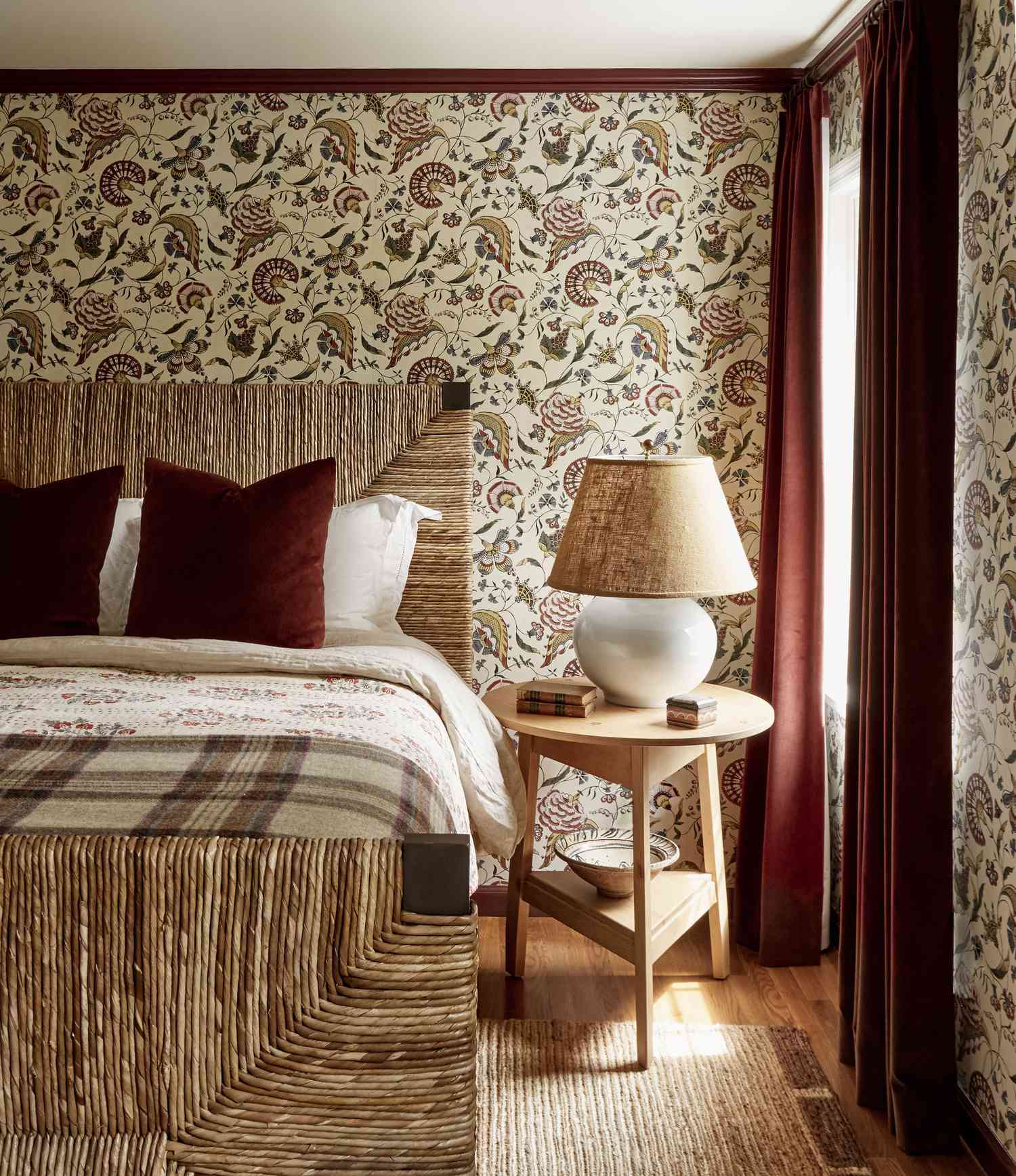 rattan and burgundy bedroom